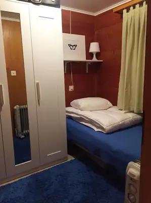 Ein Bett oder Betten in einem Zimmer der Unterkunft Chalet Julia mit Sauna