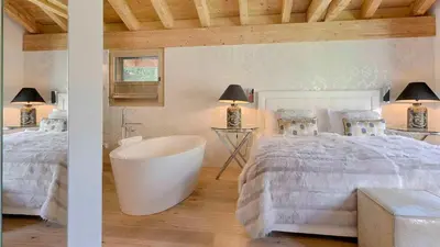 Ein Bett oder Betten in einem Zimmer der Unterkunft Chalet White Pearl in Zermatt
