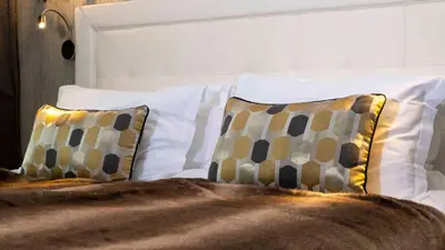 Ein Bett oder Betten in einem Zimmer der Unterkunft Chalet White Pearl in Zermatt