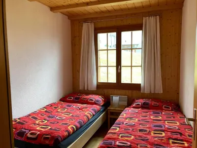 Ein Bett oder Betten in einem Zimmer der Unterkunft Chalet Abendstern
