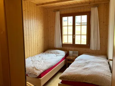 Ein Bett oder Betten in einem Zimmer der Unterkunft Chalet Abendstern