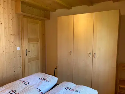Ein Bett oder Betten in einem Zimmer der Unterkunft Chalet Abendstern
