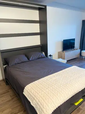 Ein Bett oder Betten in einem Zimmer der Unterkunft Studio élégant rénové avec vue à Anzère