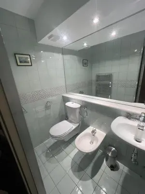 Ein Badezimmer in der Unterkunft Bel appartement deux chambres à coucher Etrier