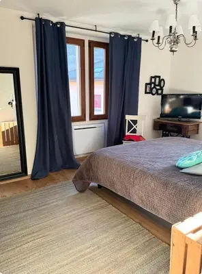 Ein Bett oder Betten in einem Zimmer der Unterkunft Appartement 70m2, entrée autonome, lit 180x200, terrasse privée, parking gratuit