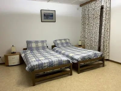 Ein Bett oder Betten in einem Zimmer der Unterkunft pensione Vais