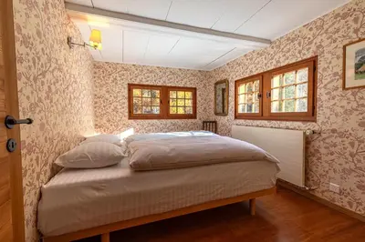 Ein Bett oder Betten in einem Zimmer der Unterkunft Supersaxo QUIET & CHARMING chalet 8 pers