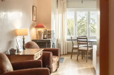 Ein Sitzbereich in der Unterkunft Alpine Sunset l Attique l Golf l By CosyHome