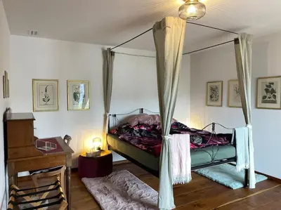 Ein Bett oder Betten in einem Zimmer der Unterkunft Cloud Garden Maisonette