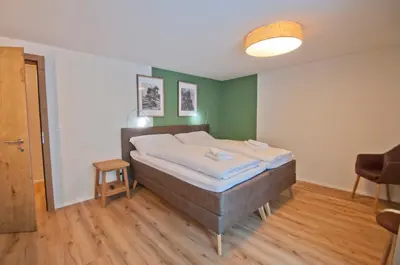 Ein Bett oder Betten in einem Zimmer der Unterkunft Chalet Aeschhorn