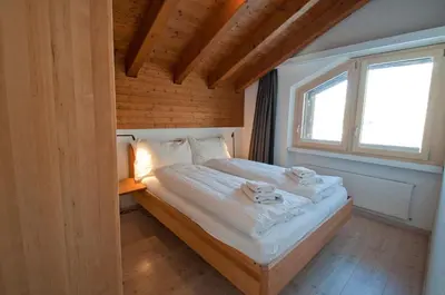 Ein Bett oder Betten in einem Zimmer der Unterkunft Chalet Kamanga