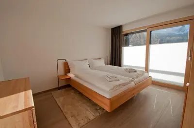 Ein Bett oder Betten in einem Zimmer der Unterkunft Chalet Kamanga