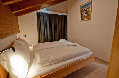 Ein Bett oder Betten in einem Zimmer der Unterkunft Chalet Kamanga