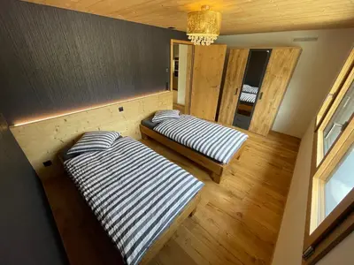 Ein Bett oder Betten in einem Zimmer der Unterkunft Bergblick Apartments - Schwarzhorn