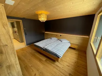 Ein Bett oder Betten in einem Zimmer der Unterkunft Bergblick Apartments - Schwarzhorn