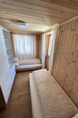 Ein Bett oder Betten in einem Zimmer der Unterkunft Apartment Haus Alpengruss EG by Interhome