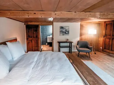 Ein Bett oder Betten in einem Zimmer der Unterkunft Apartment Chalet Solegg by Interhome