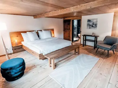 Ein Bett oder Betten in einem Zimmer der Unterkunft Apartment Chalet Solegg by Interhome