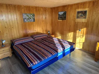 Ein Bett oder Betten in einem Zimmer der Unterkunft Apartment Ferienwohnung Gehrihorn by Interhome