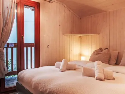 Ein Bett oder Betten in einem Zimmer der Unterkunft Chalet Chalet Grepon by Interhome