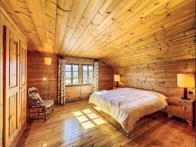 Ein Bett oder Betten in einem Zimmer der Unterkunft Chalet Sergnoud by Interhome