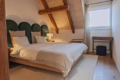 Ein Bett oder Betten in einem Zimmer der Unterkunft Hidden Retreats The Alpstyle
