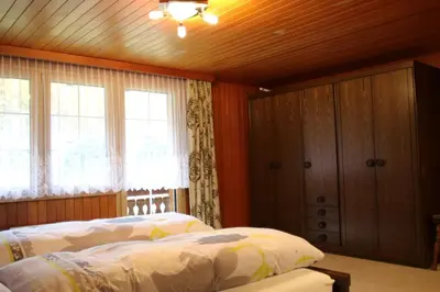 Ein Bett oder Betten in einem Zimmer der Unterkunft Saastal Apartments Haus Antrona