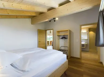 Ein Bett oder Betten in einem Zimmer der Unterkunft Hidden Retreats Alpine Edge