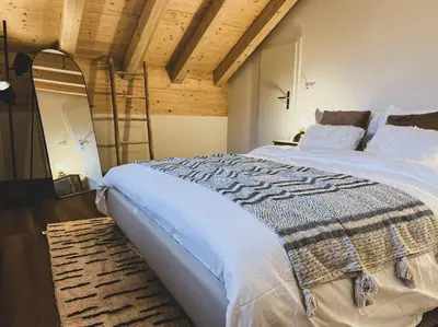 Ein Bett oder Betten in einem Zimmer der Unterkunft Hidden Retreats The Lohner