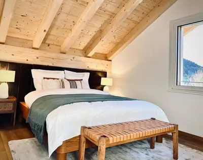 Ein Bett oder Betten in einem Zimmer der Unterkunft Hidden Retreats The Niesen