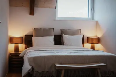 Ein Bett oder Betten in einem Zimmer der Unterkunft Hidden Retreats The GlacierDoor
