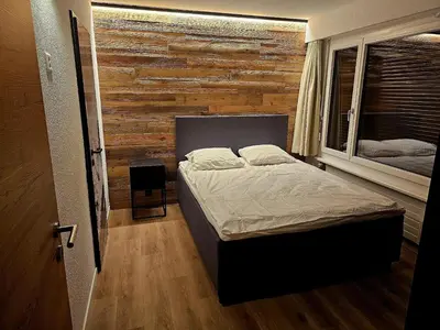 Ein Bett oder Betten in einem Zimmer der Unterkunft Havre de Paix et Confort à Vercorin, avec vue Panoramique