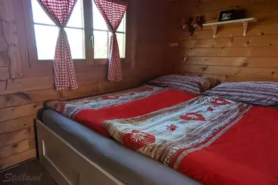 Ein Bett oder Betten in einem Zimmer der Unterkunft Übernachten in Blockhaus