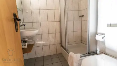 Ein Badezimmer in der Unterkunft Ferienwohnungen Haus Butterfly, Saas-Fee