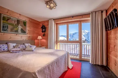 Ein Bett oder Betten in einem Zimmer der Unterkunft Caspar Penthouse