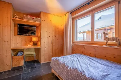 Ein Bett oder Betten in einem Zimmer der Unterkunft Caspar Penthouse