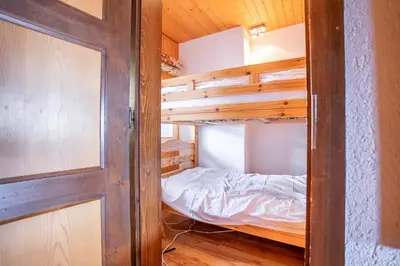 Ein Bett oder Betten in einem Zimmer der Unterkunft Chalet Rübezahl 1 OG