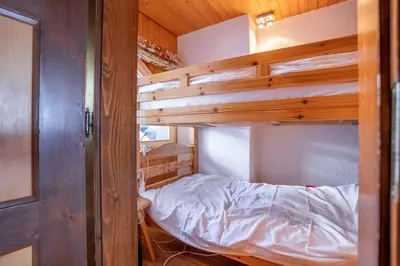 Ein Bett oder Betten in einem Zimmer der Unterkunft Chalet Rübezahl 1 OG