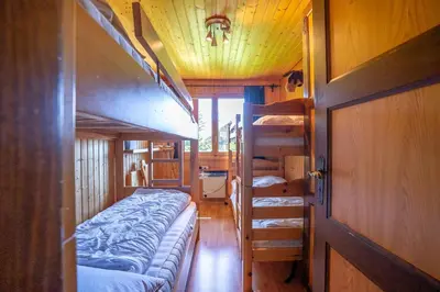 Ein Bett oder Betten in einem Zimmer der Unterkunft Chalet Rübezahl Attika
