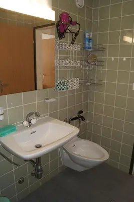 Ein Badezimmer in der Unterkunft Haus Richemont