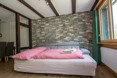 Ein Bett oder Betten in einem Zimmer der Unterkunft Ferienwohnung am Bach