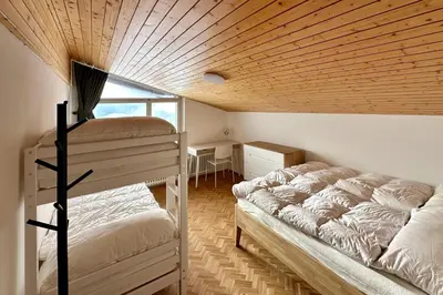 Ein Bett oder Betten in einem Zimmer der Unterkunft Valaisia 50