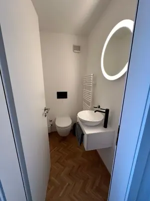 Ein Badezimmer in der Unterkunft Valaisia 50