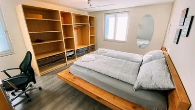 Ein Bett oder Betten in einem Zimmer der Unterkunft Swiss House with Mountain Views