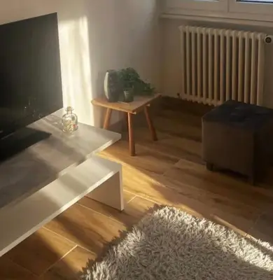 Ein Sitzbereich in der Unterkunft Appartement rénové