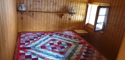Ein Bett oder Betten in einem Zimmer der Unterkunft Chalet Bel Horizon