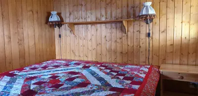 Ein Bett oder Betten in einem Zimmer der Unterkunft Chalet Bel Horizon