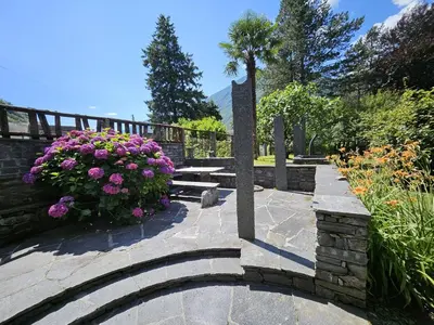 Ein Garten an der Unterkunft Rustico La Rocca by Fewotessin