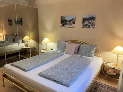 Ein Bett oder Betten in einem Zimmer der Unterkunft Lago Maggiore by Fewotessin