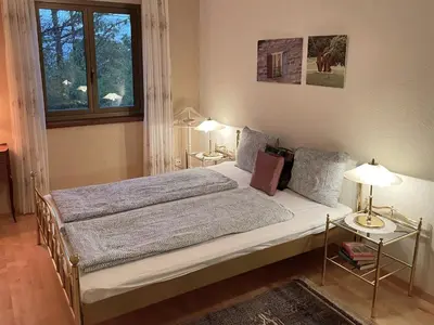 Ein Bett oder Betten in einem Zimmer der Unterkunft Lago Maggiore by Fewotessin